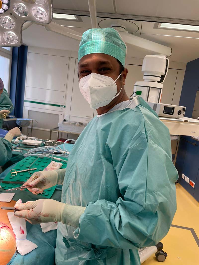 Dr. Vashisht performing breast surgery during his fellowship